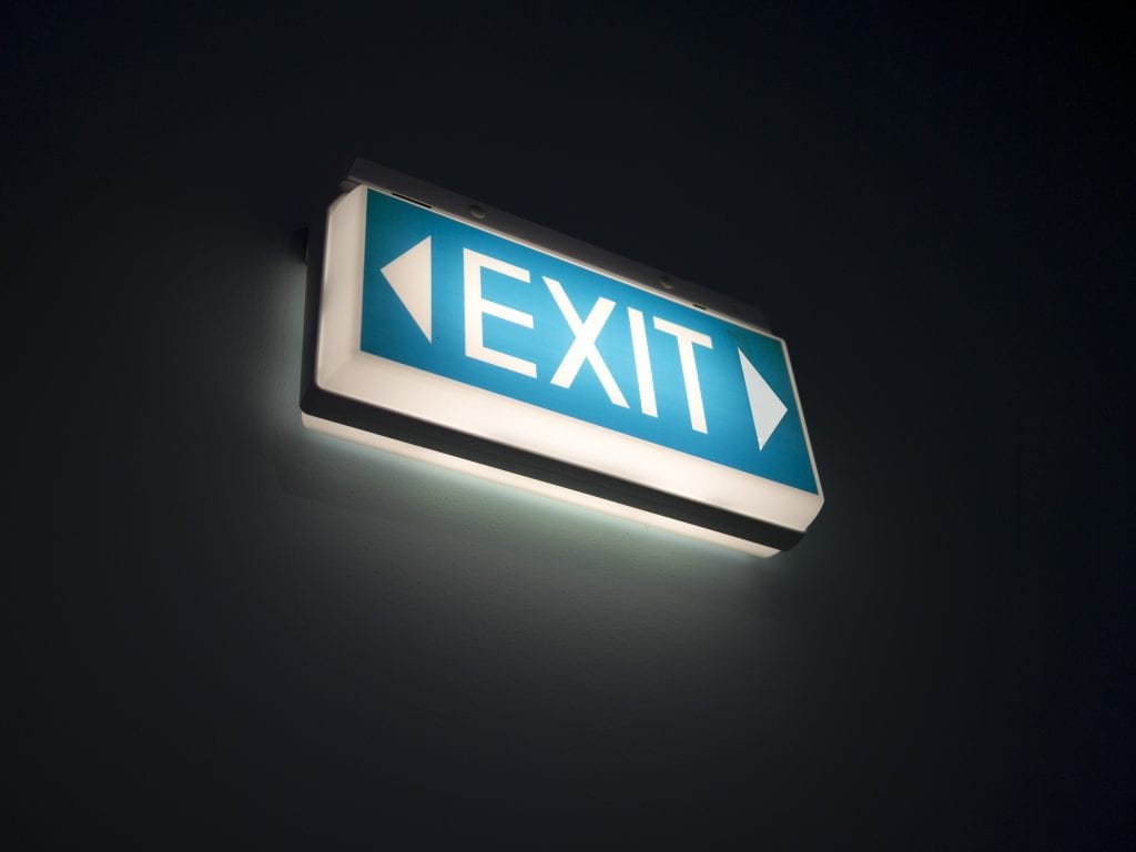 an exit sign is lit